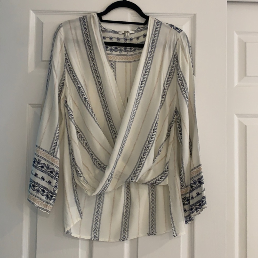 Top.  Long in back. Draped front
